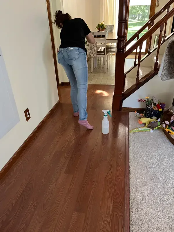 Cleaner mopping hardwood floors during a one-time cleaning